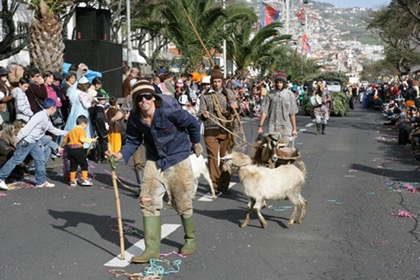 Man with goat in comedy parade