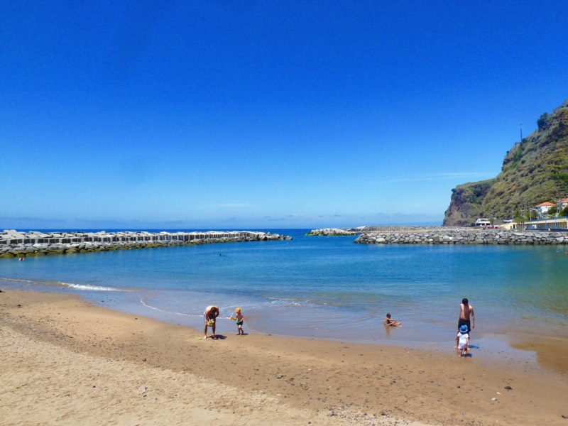 Image of family playing on Calheta Beach Madeira